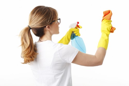 Local cleaning team working in a Kennington flat with limited access